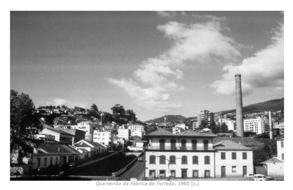 The chimney of the Torreão sugar factory over Funchal rooftops, circa 1960
